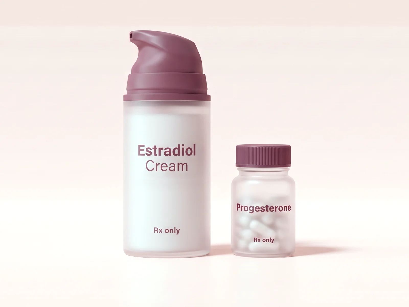 A frosted pump bottle labelled Estradiol Cream beside a small bottle labelled Progesterone.